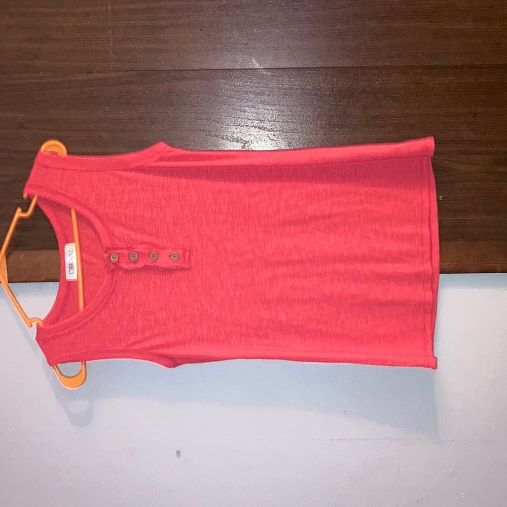 4 tank tops $15 a piece all new never worn. 1 coral, 1 red, 1 black, and 1 white